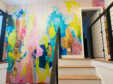 Colorful modern entry way into second story with aqua, lime and pink wallpaper mural by Vivian Ferne.