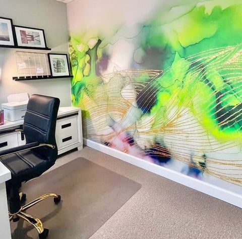 Office space interior design concept with green and gold abstract wallpaper mural by Vivian Ferne. This peel and stick wallpaper mural was made with peel and stick wallpaper by a women owned interior design business Vivian Ferne.