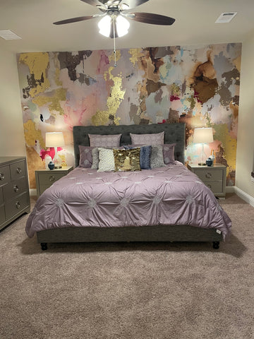 Bedroom interior design with carpet, purple duvet and colorful wallpaper mural from Vivian Ferne. Wallpaper murals create stunning bursts of color on accent walls or feature walls and are great pieces of decor for a cozy dormroom.
