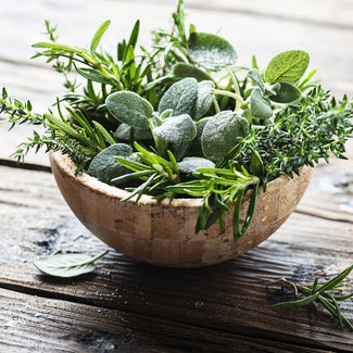 Bowl Of Fresh Herbs Picked From A California Garden