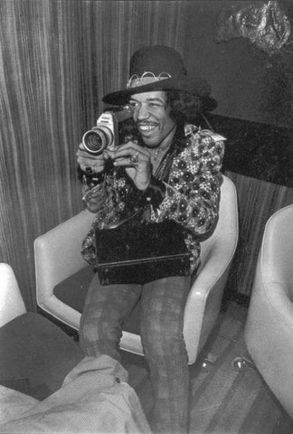 Jimi Hendrix with Canon 814 super 8 camera