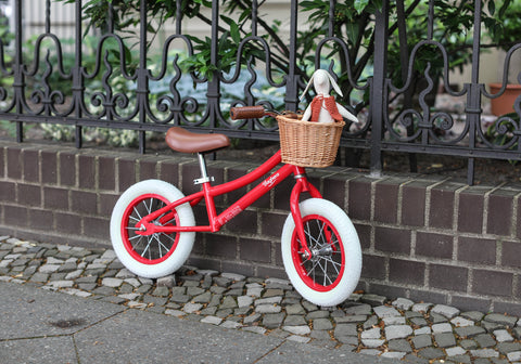 vintage balance bike with basket