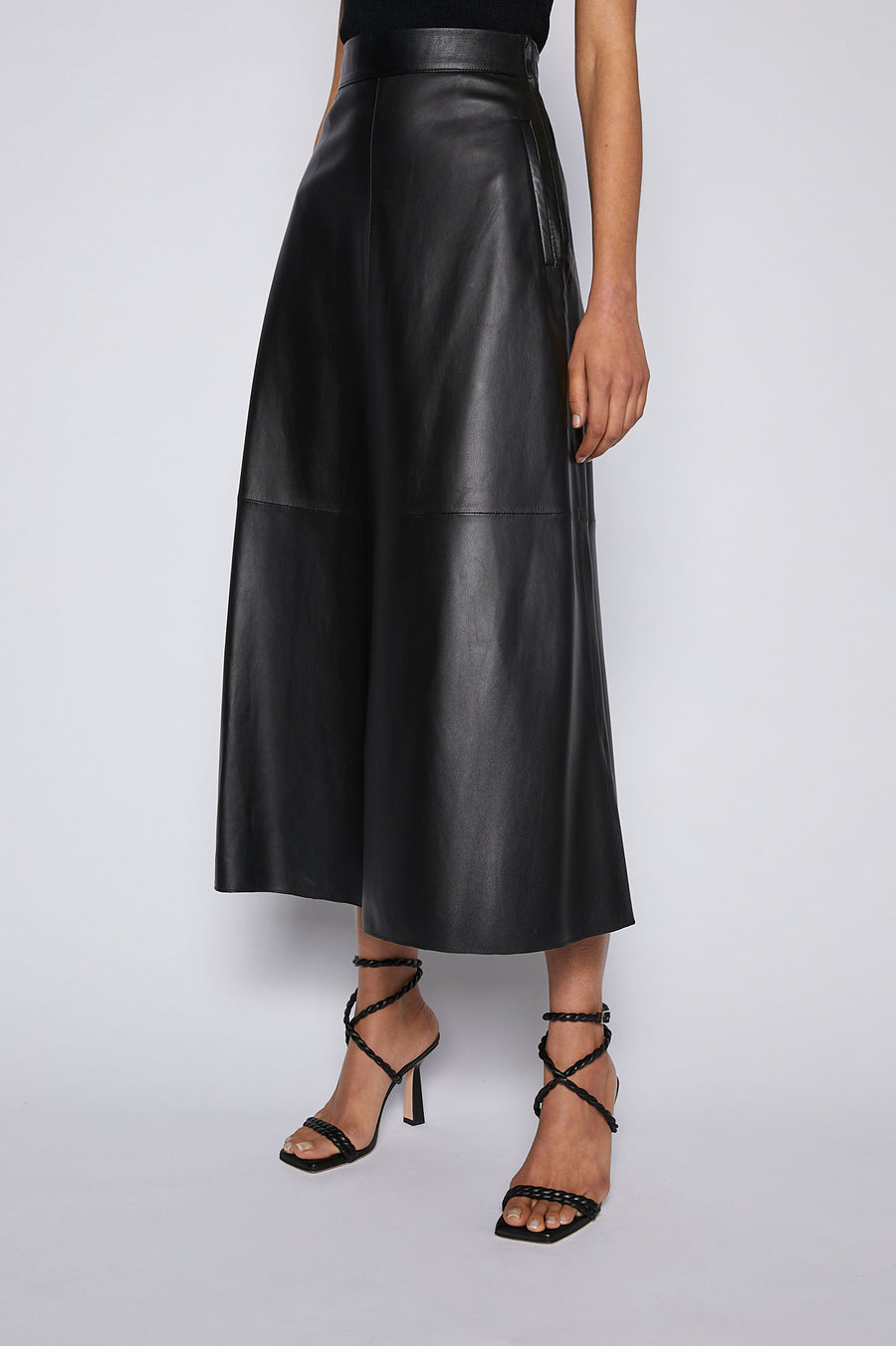 Reinvent your winter staples and invest in the leather long skirt.