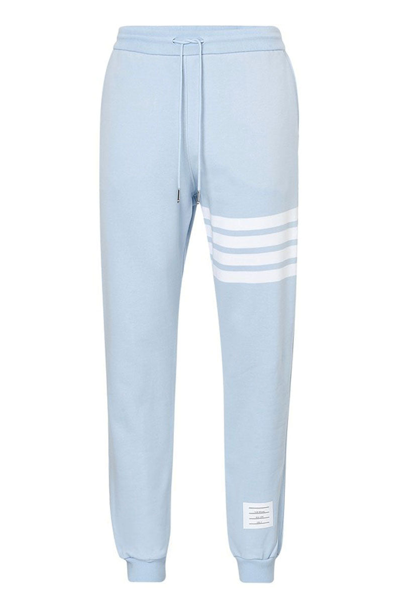 blue sweatpants with white stripe