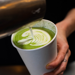 matcha latte being poured