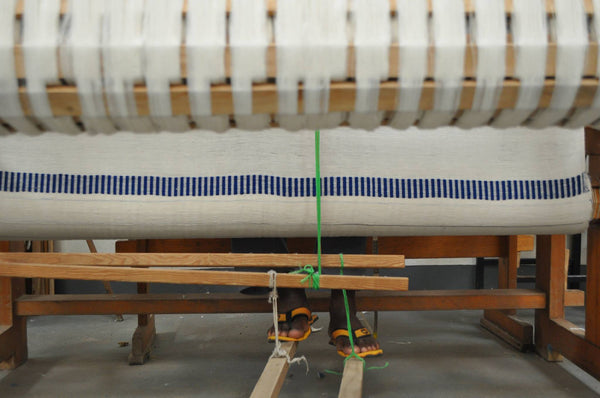 Hand loom weaver working