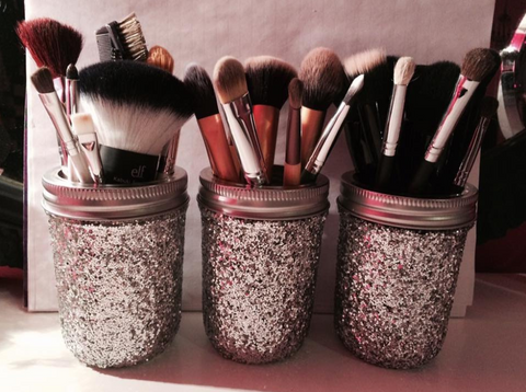 Use jars to store brushes, lip colors, and mascara