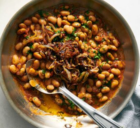 ROSEMARY BEANS WITH FRIZZLED ONIONS AND TOMATOES