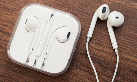 Apple EarPod on Wood Surface