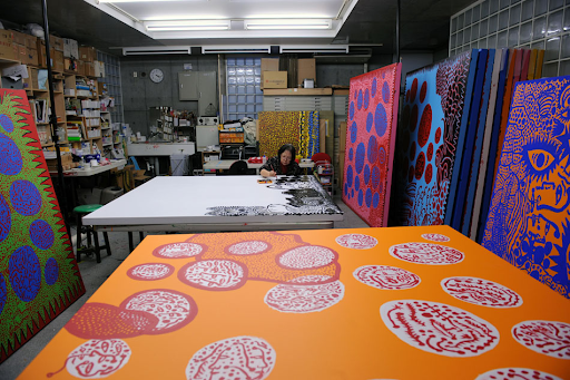 Kusama in her studio, Tokyo, Japan, December 2010 / Image courtesy: Ota Fine Arts, Tokyo / © Yayoi Kusama, Yayoi Kusama Studio inc.