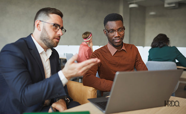 Leader Speaking With an Employee