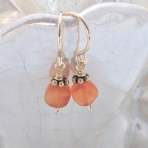 https://xqy1v2r8kujsdep8-17526741.shopifypreview.com/products/tiny-embellished-carnelian-drops?_pos=2&_sid=310a00ec8&_ss=r