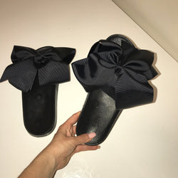 black slides with bow