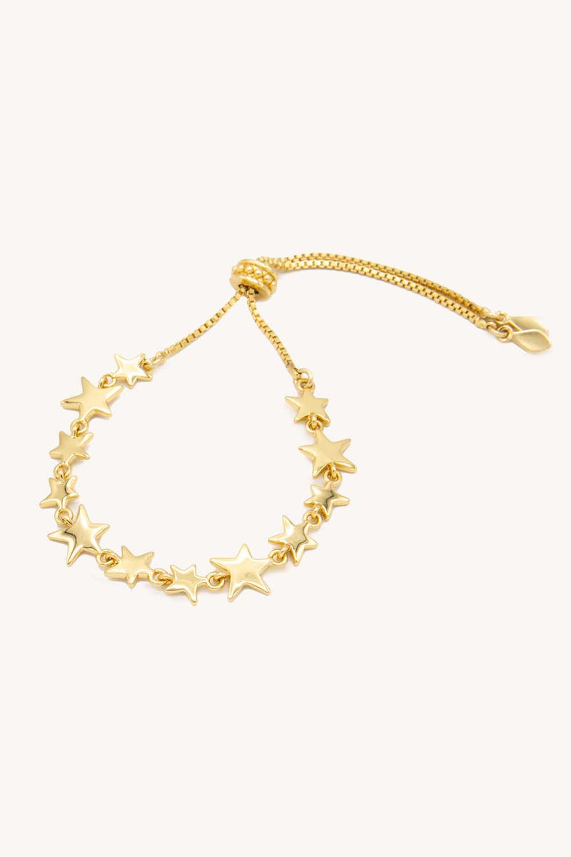 Rebecca Minkoff Scattered Stars Adjustable Charm Bracelet In Gold