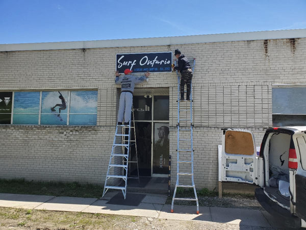 The Surf Ontario shop sign going up in the spring.
