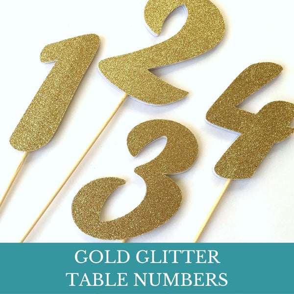 gold glitter wedding table numbers