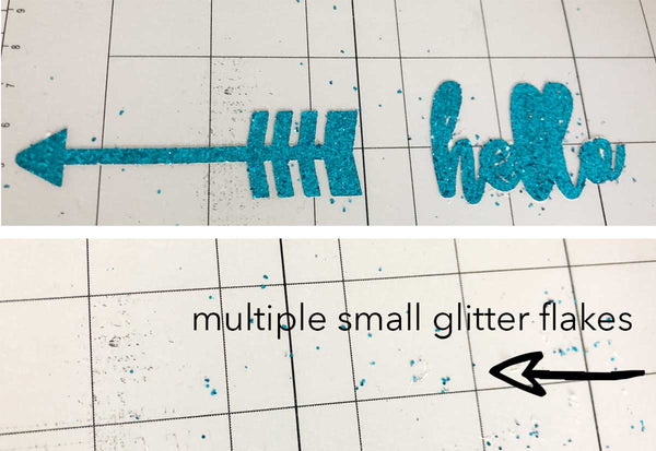 glitter paper cutouts on a cutting mat