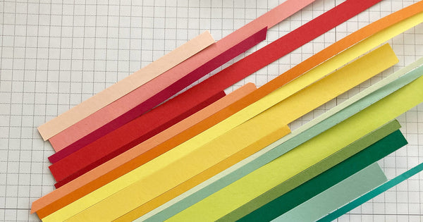 rainbow of colored paper scraps