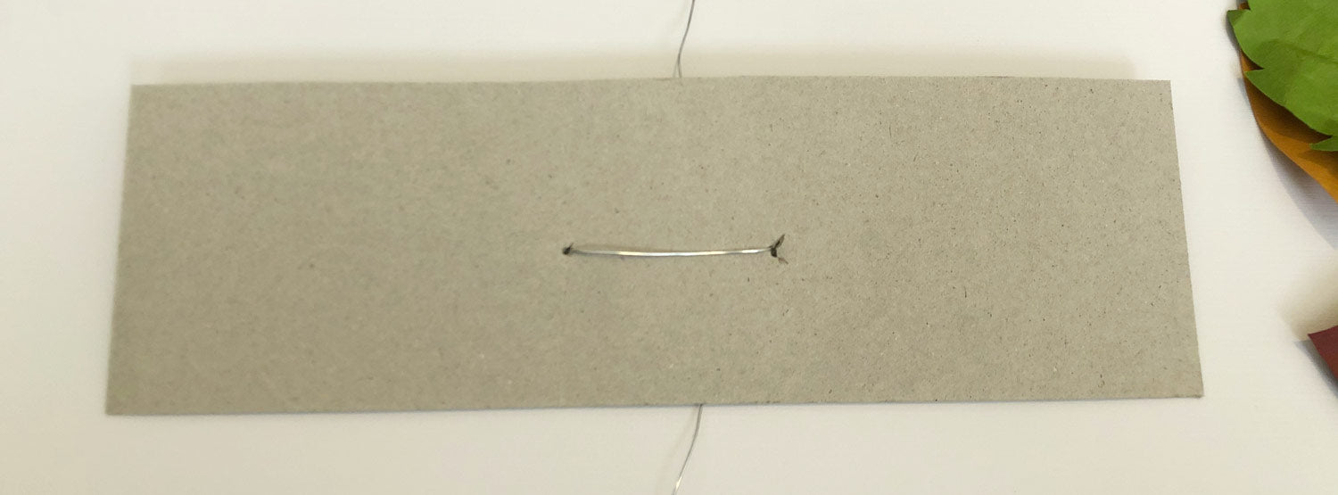 chipboard rectangle base with wire in it