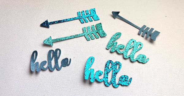 hello and arrow cut from glitter paper 