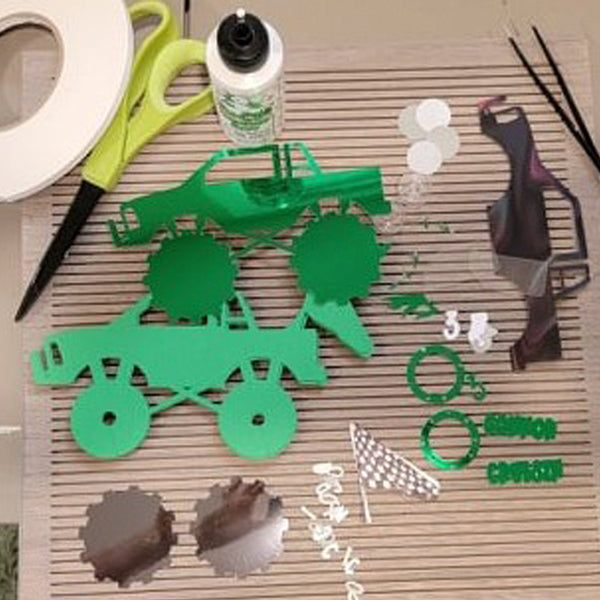 supplies needed to assemble a monster truck cake topper 