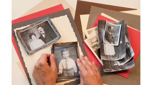 vintage photos being used in a scrapbook album