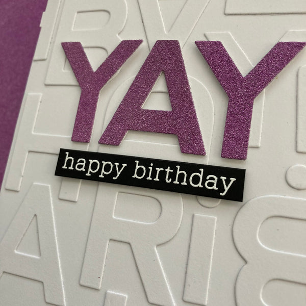 handmade card with unused letters