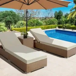 two sun loungers by pool area