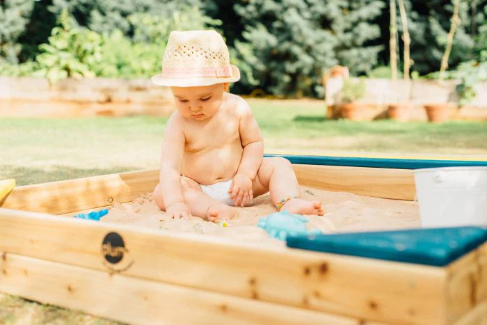 sandpit with toddler