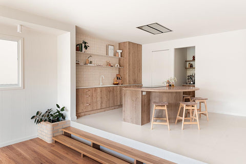 Kitchen of H&G Designs with round bench