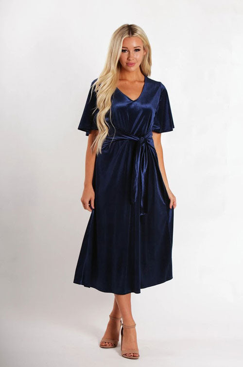 a blue velvet midi dress