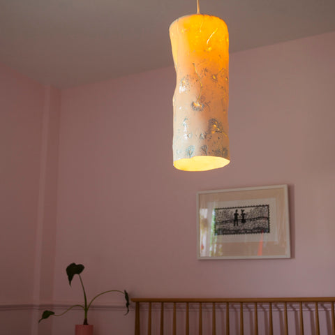 Large Blossom pendant shade above bed