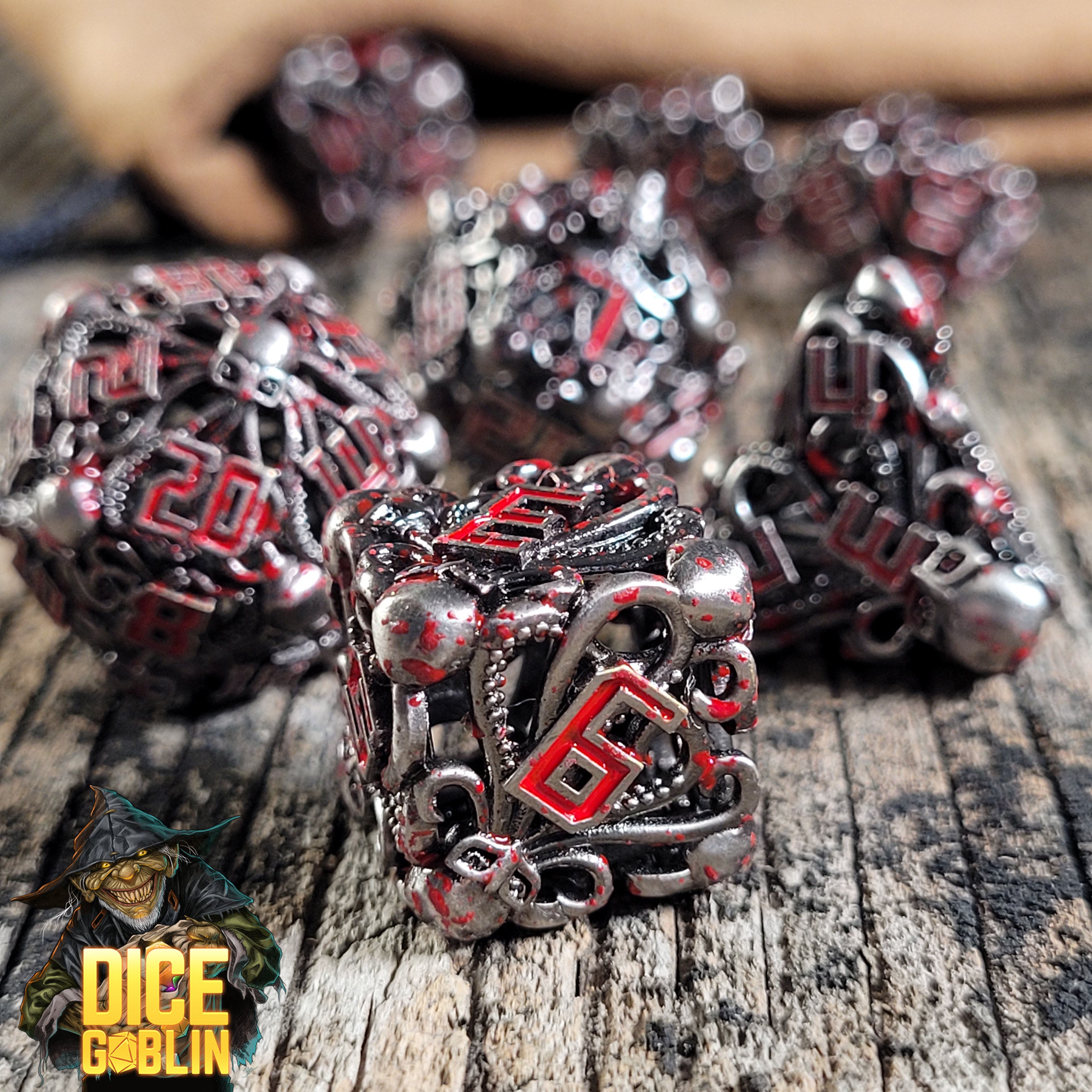 Dice Goblin Fathomless Fate Silver with Blood Splatter Hollow Metal RPG Dice Set
