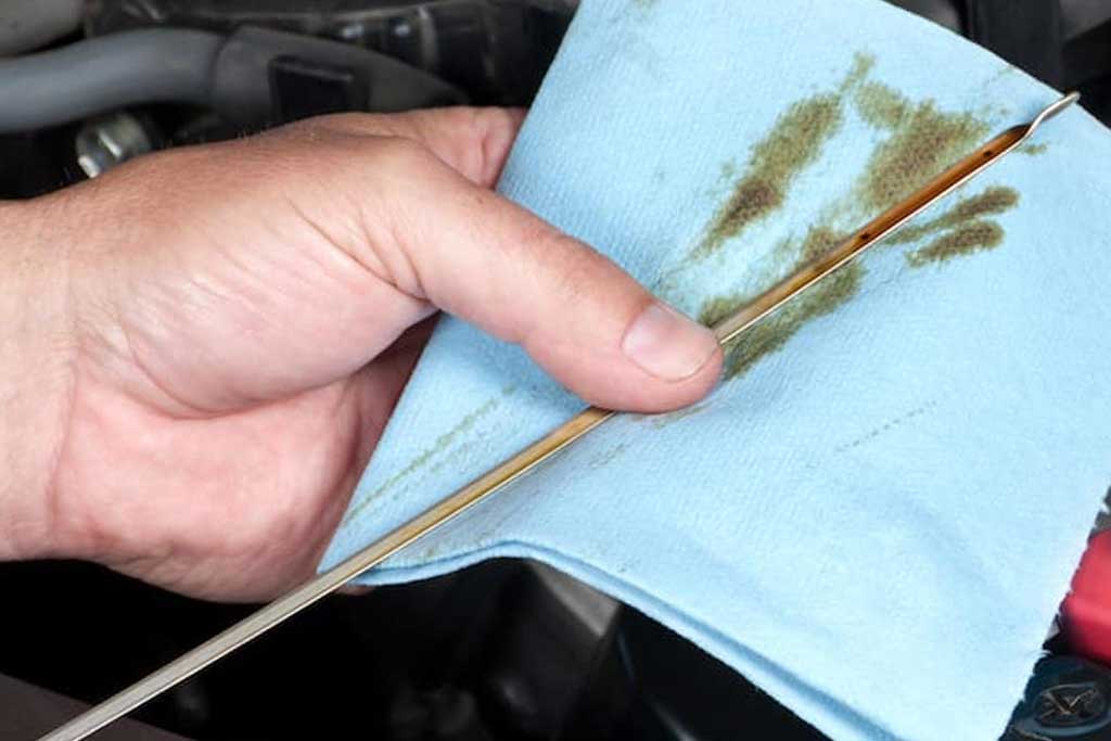 wiping oil off of hand rag