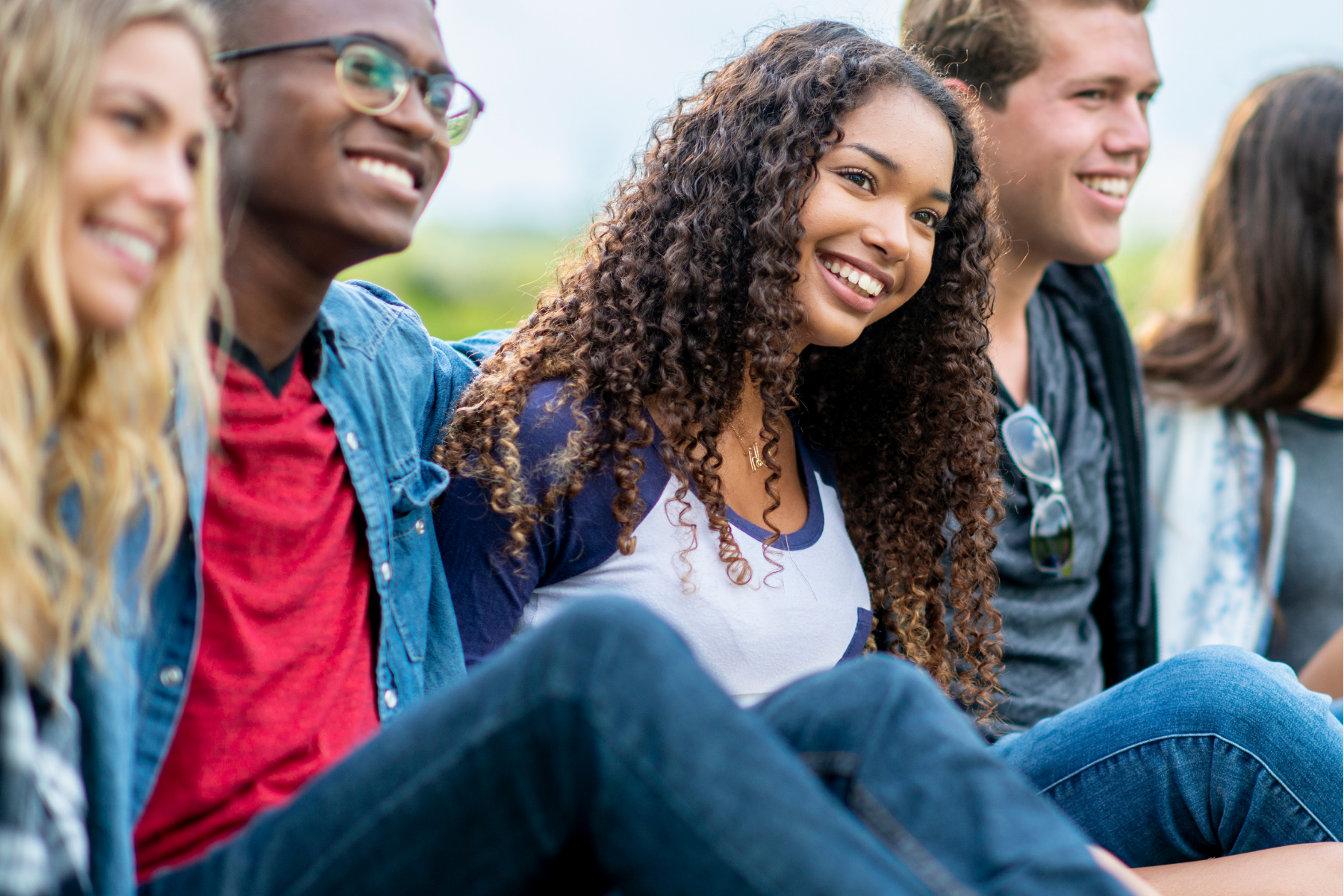 Group of friends smiling and laughing. | 5 Things You Should Know About Acne | TEENOLOGY Blog