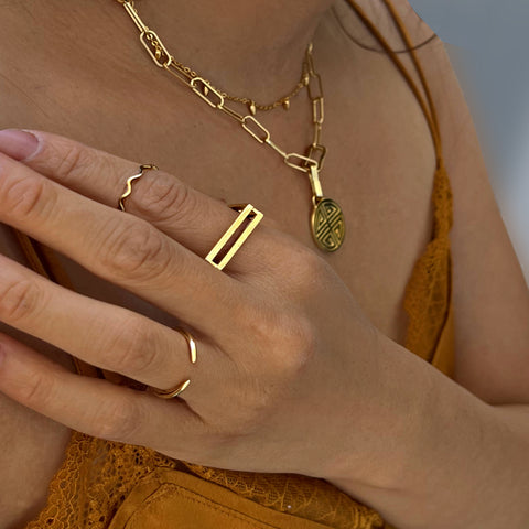 minimal ring stacking and necklace layering gold jewelry by sonia hou
