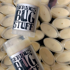 Fresh tubes of all natural bug repellent are piled together