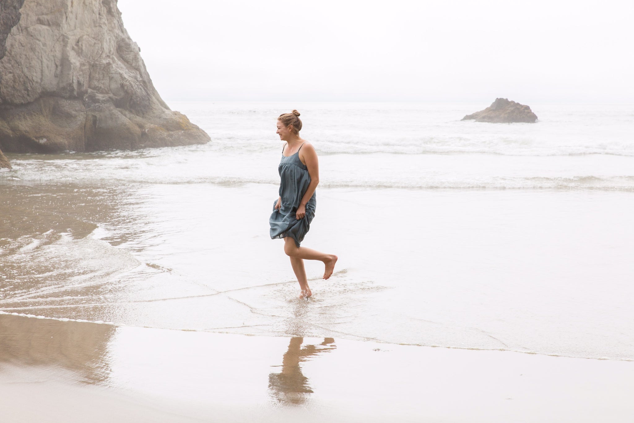 Portland musician, Hanna Haas, wearing CP Shades dress in ocean