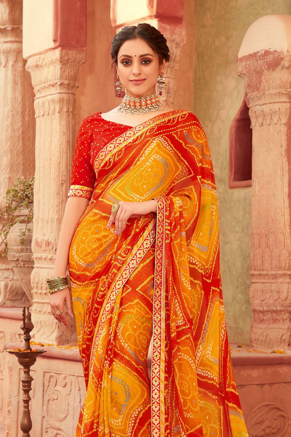 Buy the amazing Vermillion Orange Bandhani Saree online-Karagiri