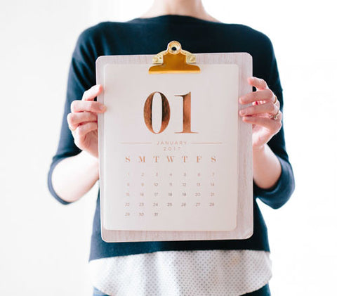woman holding calender