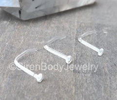 picture of three clear nose piercing retainers by siren body jewelry