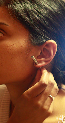 earlobe stretching with taper src wikimedia commons
