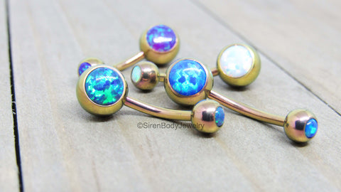 picture of rose gold anodized titanium opal body jewelry 