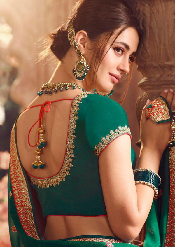 Women in Backless Blouse and Saree