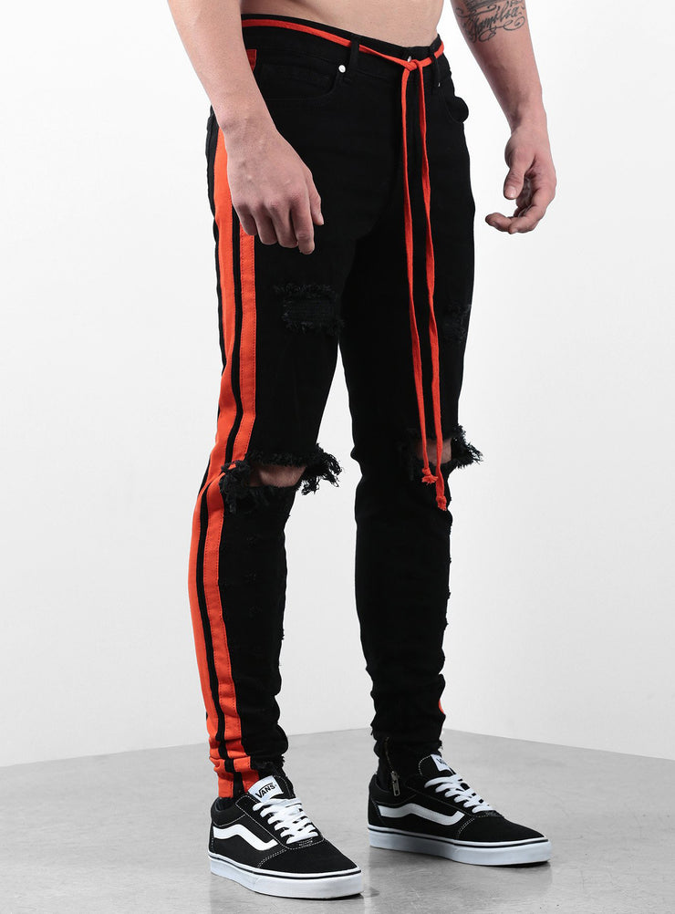 black jeans with orange stripe