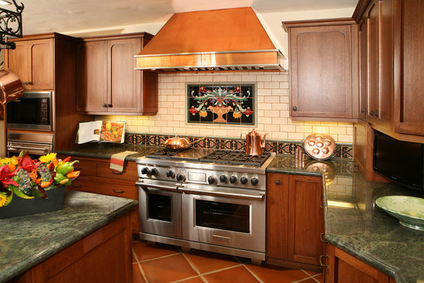 wall mount copper oven hood in a kitchen