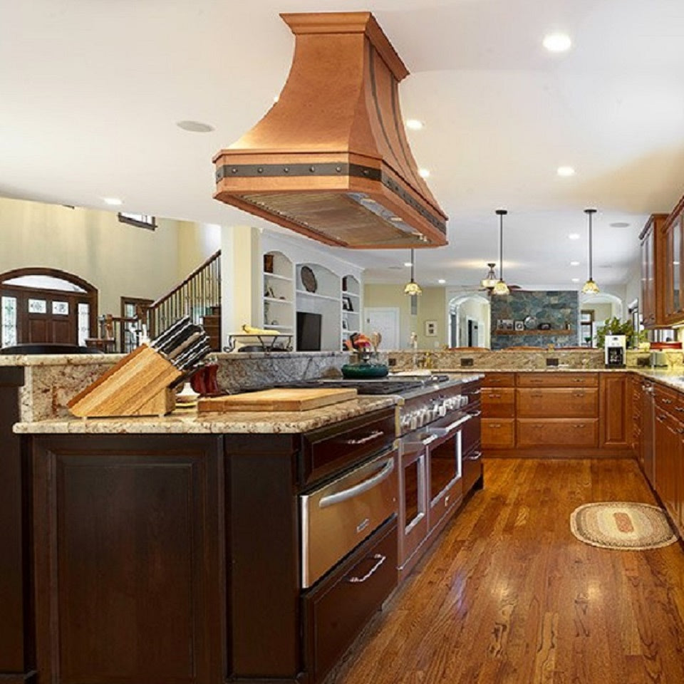 custom made metal range hood for a kitchen in wall mount version