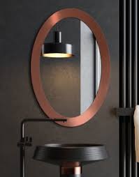 coper oval mirrors hanged on the living room wall