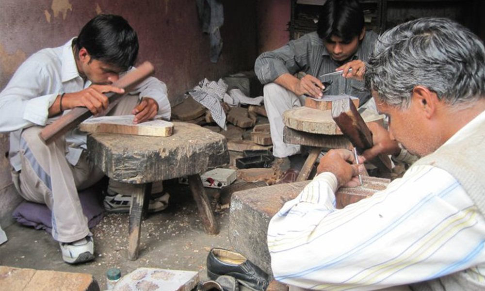 Men making block prints.