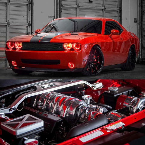 A red Dodge Challenger features ORACLE's red halo headlights and fog lights.